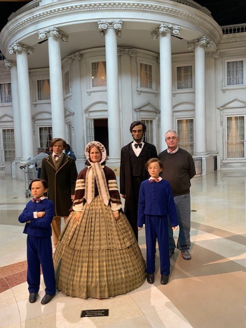 Ken Noe with representations of the Lincoln family.